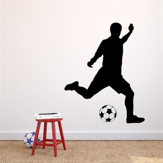 Wallsticker med en fotballspiller som sparker en ball